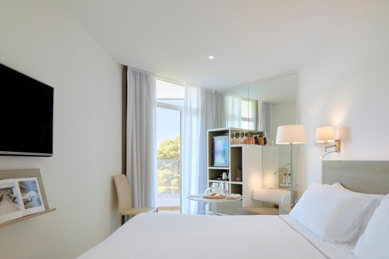 Отель Melia Cala Galdana Кала-Галдана Экстерьер фото A room at the hotel