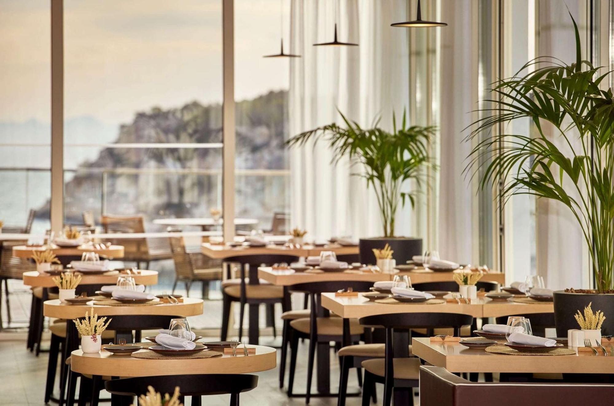 Отель Melia Cala Galdana Кала-Галдана Экстерьер фото Restaurant